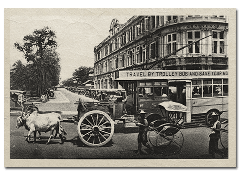 Traffic at the junction of Hill Street and Stamford Road, 1920s